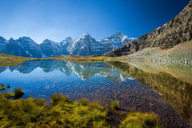 <strong>Lago Minnestimma</strong> Uma floresta única de lariço (larch) se ergue logo acima do lago Moraine. Uma trilha que passa dentro dela leva ao Lago Minnestimma e uma vista espetacular para os Ten Peaks (Dez Picos) ao longe
