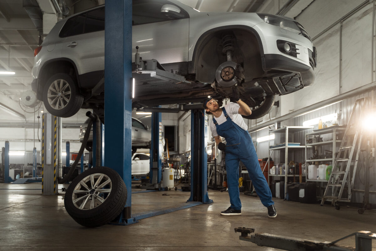 Mechanic-Working-Car-Suspension-Repair-Shop 2025 word2