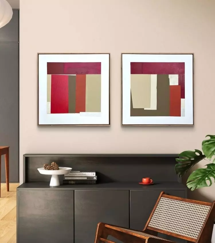 6-Vinho-Tendencia-Decoracao-2026 Sala de jantar decorada com quadro do artista plástico Adielson Rodrigues em tons de vinho, cor tendência da decoração para 2026