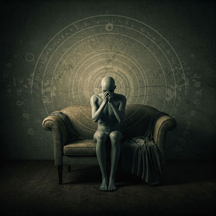 Padroes-Repetitivos-De-Comportamento-2 Figura humanóide sentada em um sofá, com postura introspectiva e mãos no rosto. Ao fundo, círculos concêntricos representam padrões psicológicos repetitivos, simbolizando reflexão, processos inconscientes e autoconhecimento em um contexto de transformação pessoal e psicanálise.