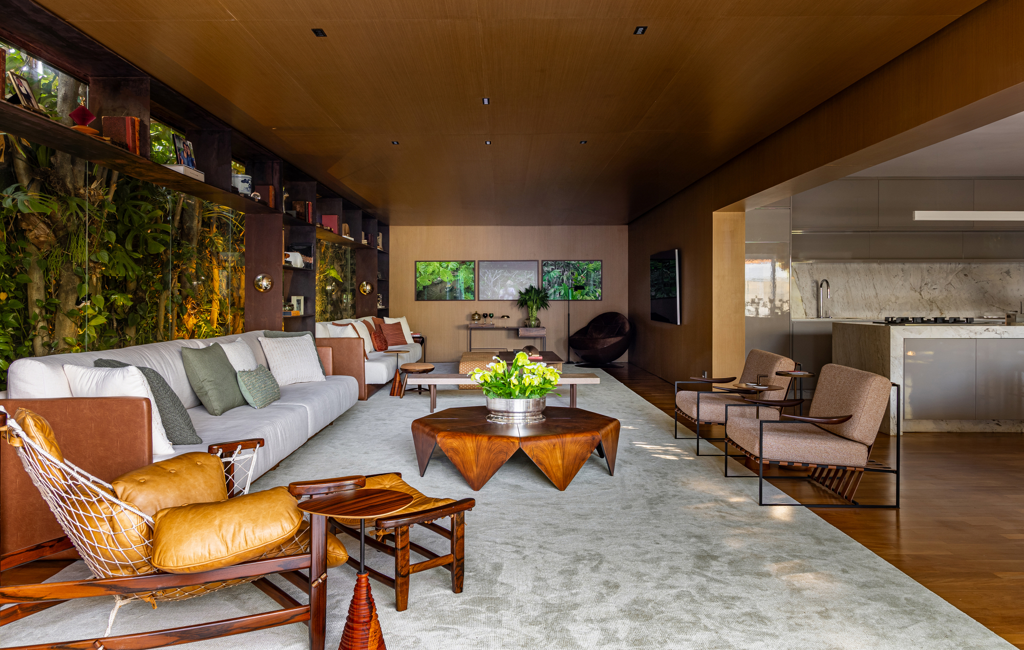 Living dividido entre estar e home definidos pelo mobiliário