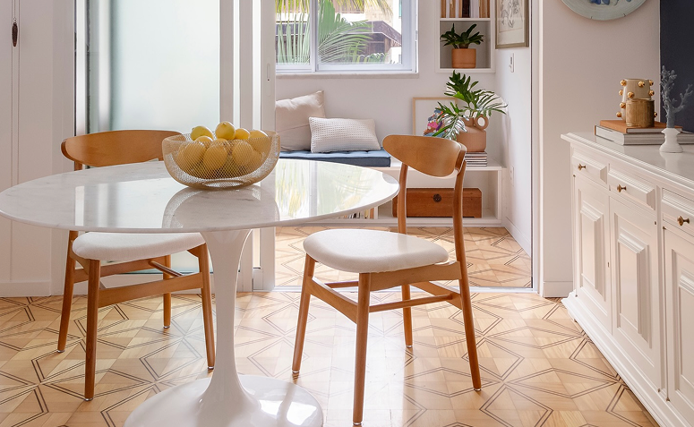 Sala de jantar com móveis reorganizados e melhor circulação