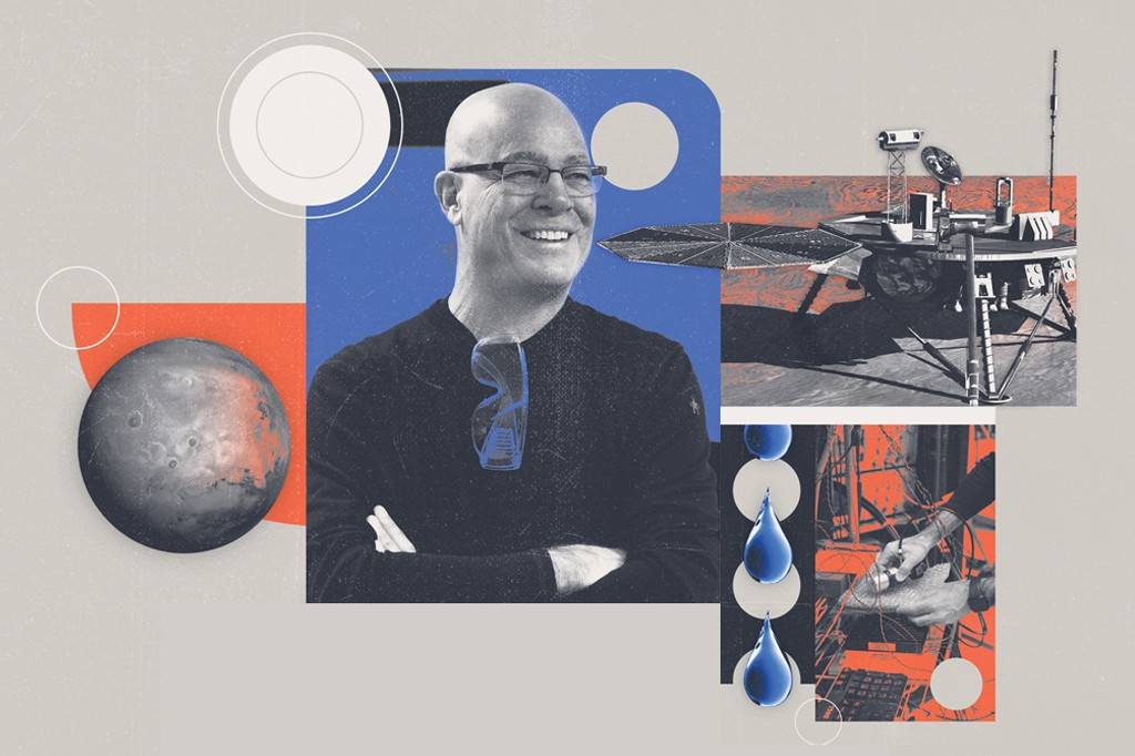 SI_489_Brasileiros_na_Nasa_3 Colagem com um homem careca sorrindo, de óculos e braços cruzados, sobre um fundo azul. À esquerda, um planeta cinza-avermelhado. À direita, um robô espacial com painéis solares e, abaixo, mãos manipulando fios elétricos, com gotas azuis e círculos brancos decorativos.