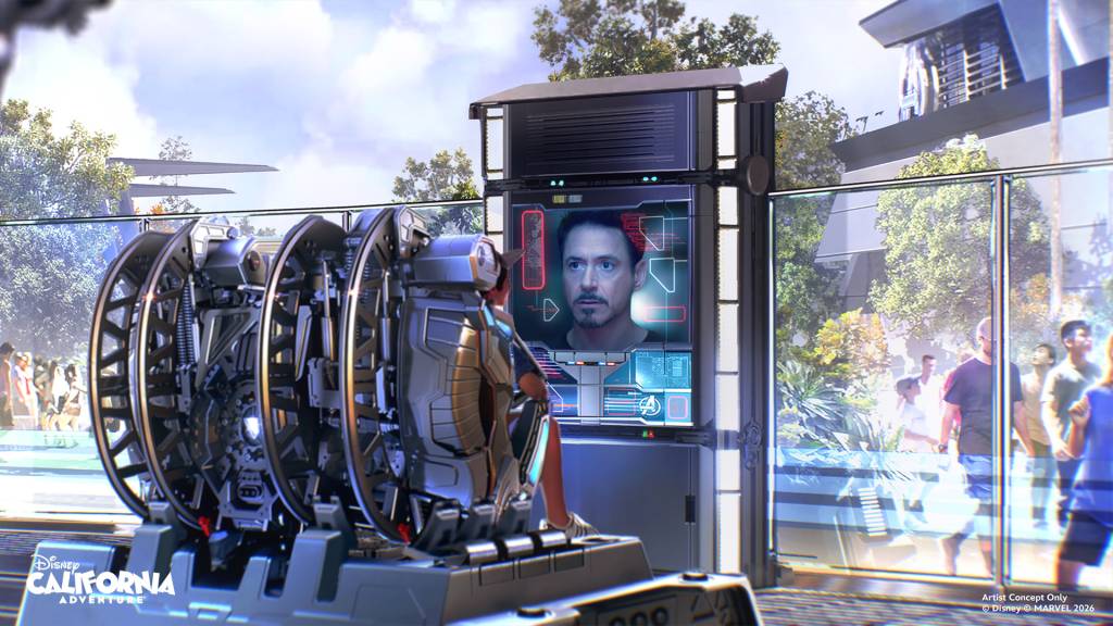Pessoa sentada em uma máquina futurista, de costas, olhando para uma tela que exibe o rosto de Robert Downey Jr. como Tony Stark, com gráficos de interface de usuário. Ao fundo, árvores, edifícios modernos e pessoas caminhando em um parque ensolarado.