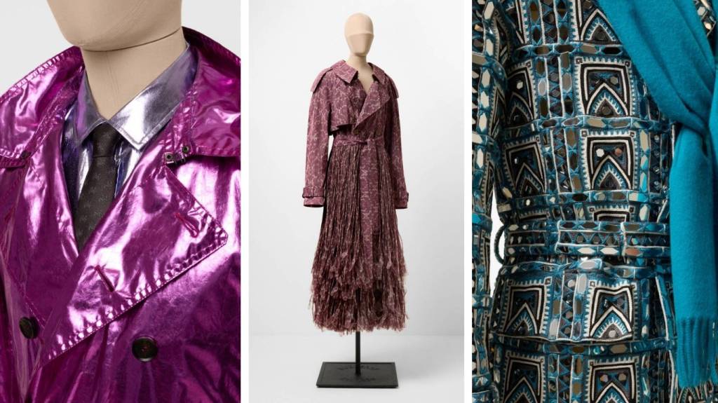 Três manequins exibem roupas: um casaco roxo brilhante com camisa prateada e gravata preta; um trench coat marrom plissado; e um vestido azul-turquesa com espelhos e um cachecol azul